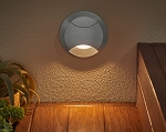 1.8W LED Landscape Pathway Light 1 - installed, gray aluminum recessed wall light installed in textured stucco wall, creating